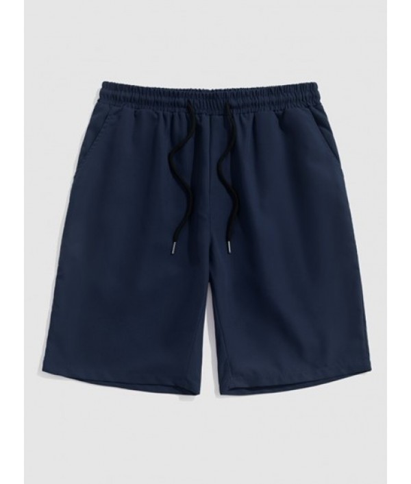 Men's Mix And Match Two Piece Set Stand Collar Vertical Striped Half Buttons Short Sleeves Pullover Shirt With Solid Color Basic Shorts Set Men's Mix And Match Two Piece Set Stand Collar Vertical Striped Half Buttons Short Sleeves Pullover Shirt With Solid Color Basic Shorts Set